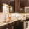 a kitchen with black cabinets
