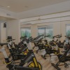 a gym with stationary bikes