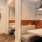 a room with a bed and a bench